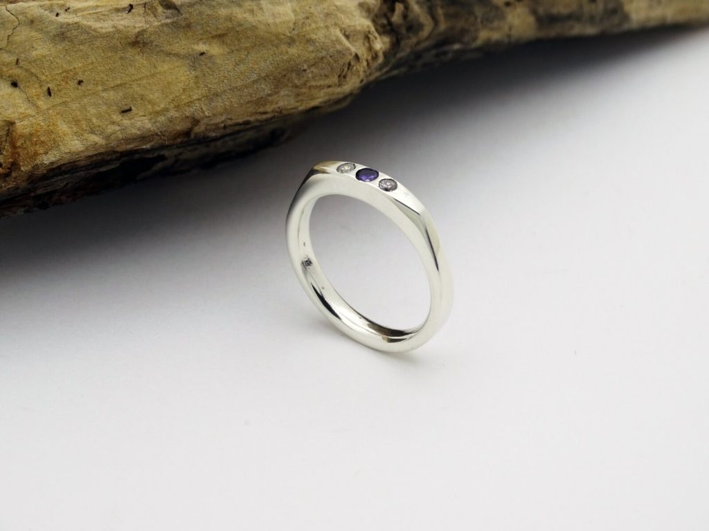 Amethyst and cubic zirconia ring