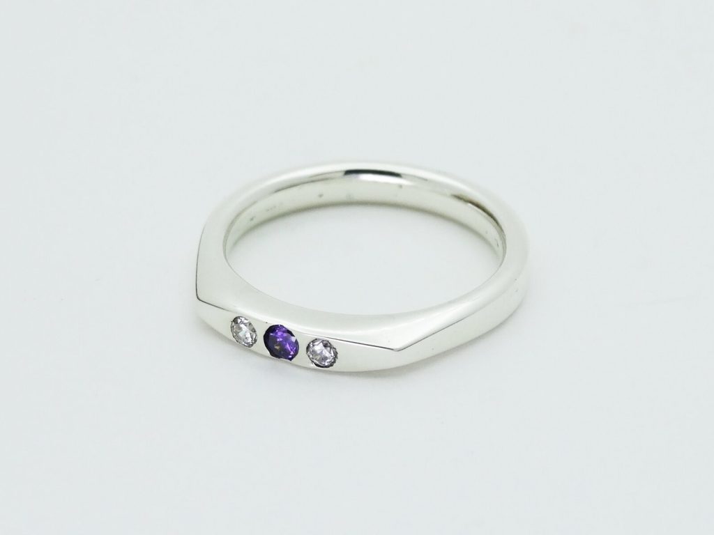 Amethyst and cubic zirconia ring